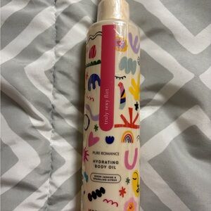Pure Romance Truly Sexy Flirt Body Oil with Colorful Design